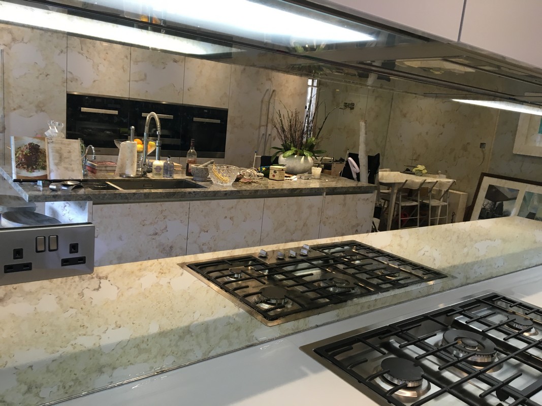 Mirror glass splashback in St Paul's luxury kitchen